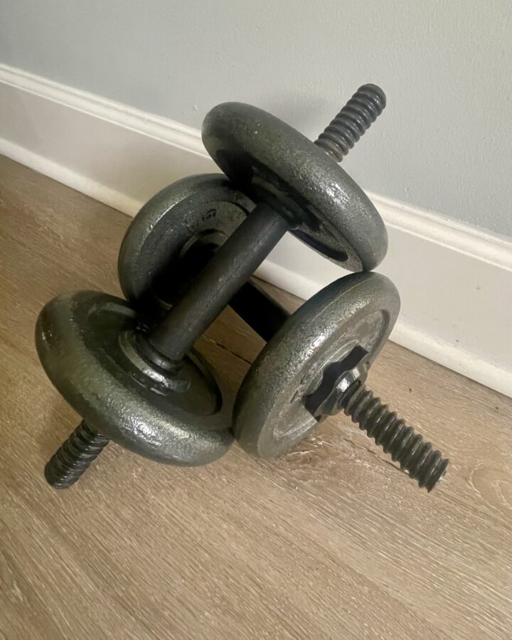 dumbells stacked and crossed